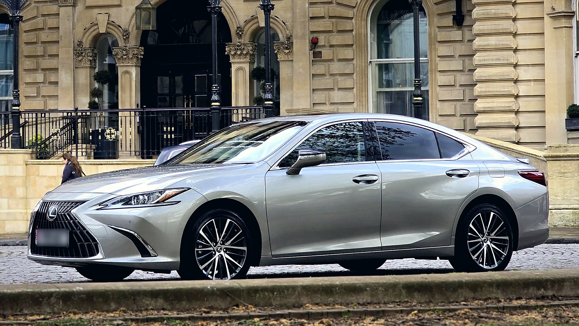 Beyond Elite Travel executive Lexus saloon waiting at a Bristol hotel entrance