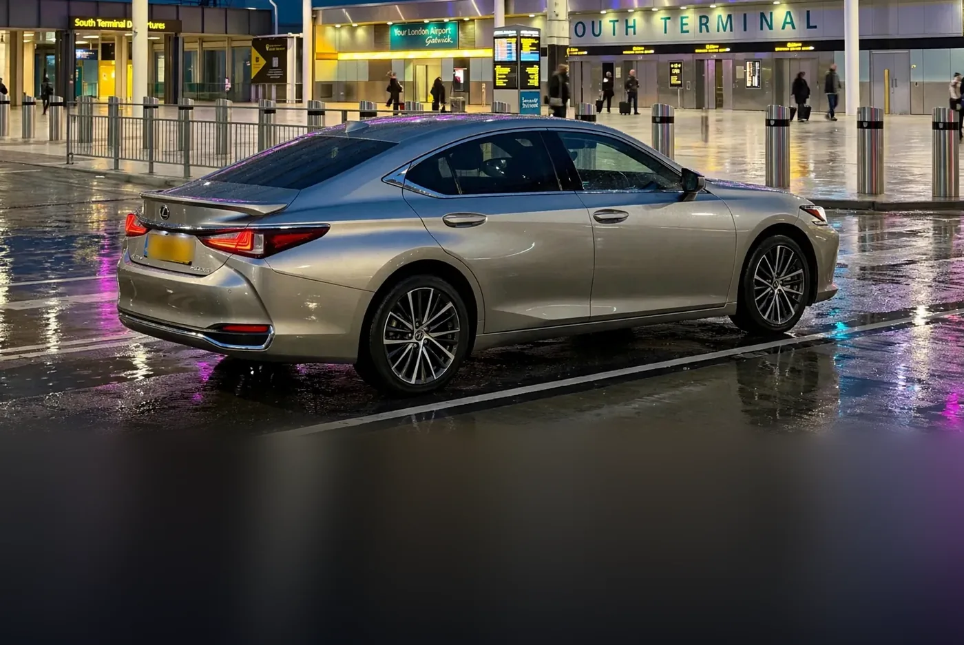Beyond Elite Travel executive Lexus saloon at the Gatwick South Terminal forecourt