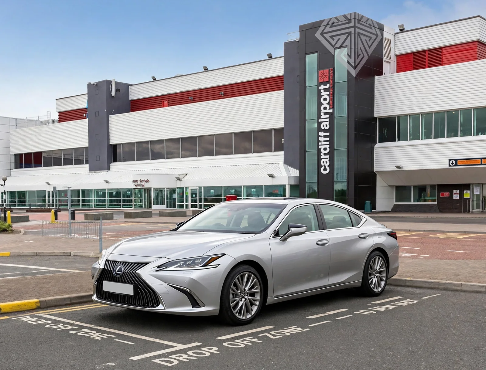 Silver Lexus ES executive saloon at the drop-off zone outside the Cardiff Airport terminal